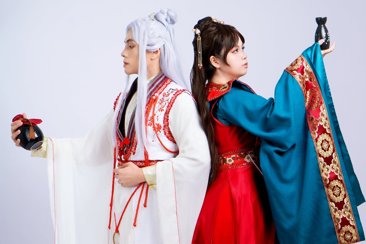 Artistic portrayal of mythical characters in traditional Asian costumes, symbolizing fate and reincarnation.